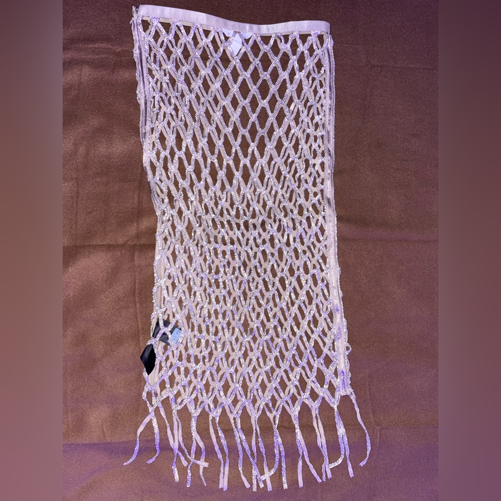 Net skirt embroidered with glass beads
